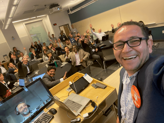 Close-up selfie of Mustafa Sualp speaking at the IMS Global Learning Analytics Summit 2019